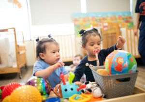 INIC preschool infants exploring sensory play toys